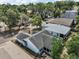 Aerial view of property showcasing its well-maintained roof, and backyard at 38 Townhill Dr, Eustis, FL 32726