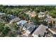 Aerial view of the property highlighting its location, landscaping, and neighborhood at 38 Townhill Dr, Eustis, FL 32726