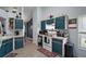 Functional kitchen features classic cabinets and modern appliances at 38 Townhill Dr, Eustis, FL 32726