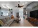 Open living area featuring tile floors and ample natural light at 38 Townhill Dr, Eustis, FL 32726