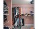 Functional walk-in closet with ample shelving and hanging space for organized storage at 38 Townhill Dr, Eustis, FL 32726