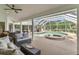 Secluded pool and spa area with covered seating and lush landscaping at 39206 Treeline Dr, Lady Lake, FL 32159