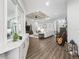Open concept design featuring the living room with a clear view of the kitchen and dining areas at 39653 Grove Hts, Lady Lake, FL 32159