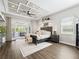 Bright main bedroom with access to outdoor hot tub at 39653 Grove Hts, Lady Lake, FL 32159