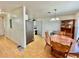 Open dining room featuring an oak table, wooden hutch, and light fixture at 40226 Palm St, Lady Lake, FL 32159