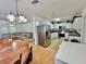 Open-concept kitchen and living area with ample space for entertaining at 40226 Palm St, Lady Lake, FL 32159