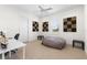 Bedroom with a ship model and checkered soundproofing tiles at 41522 Saddle Ridge Ln, Weirsdale, FL 32195