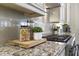 Close up on the kitchen with custom cabinets, stainless steel range, and granite countertops at 41522 Saddle Ridge Ln, Weirsdale, FL 32195