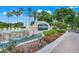 Kings Ridge community entrance with waterfall feature and landscaped entry at 4167 Capland Ave, Clermont, FL 34711