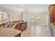 Open concept kitchen area with granite countertops and stainless steel appliances at 4320 Heritage Trl, Leesburg, FL 34748