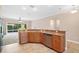 Stylish kitchen featuring granite countertops and modern stainless steel appliances at 4320 Heritage Trl, Leesburg, FL 34748