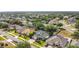 Picturesque aerial perspective of a peaceful residential setting with nicely spaced houses at 4908 Cape Hatteras Dr, Clermont, FL 34714