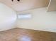 A neutral and bright bedroom is freshly painted with tile flooring and window for natural light at 4908 Cape Hatteras Dr, Clermont, FL 34714