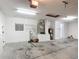 Spacious garage with overhead lighting and ample room for storage and projects at 4908 Cape Hatteras Dr, Clermont, FL 34714