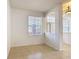 The spacious living room with tile flooring is brightened by a large window with natural light at 4908 Cape Hatteras Dr, Clermont, FL 34714