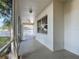 Enclosed patio featuring views of the backyard and connecting to the indoors, promoting a serene ambiance at 4908 Cape Hatteras Dr, Clermont, FL 34714