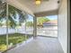 Spacious screened patio with a view of the yard, perfect for outdoor gatherings and relaxed living at 4908 Cape Hatteras Dr, Clermont, FL 34714