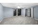 Spacious bedroom featuring carpeted flooring, a ceiling fan, closet, and a fresh, neutral paint at 5011 Se 33Rd Ave, Ocala, FL 34480