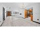 Spacious floor plan connecting living room, dining area, and kitchen for seamless entertaining at 5011 Se 33Rd Ave, Ocala, FL 34480