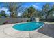 Enjoy this private backyard oasis with a sparkling pool and a charming storage shed at 5011 Se 33Rd Ave, Ocala, FL 34480