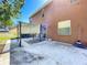 Backyard patio featuring a shade pergola, lawn and exterior views at 520 Rob Roy Dr, Clermont, FL 34711
