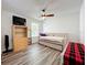 Bedroom features wood-look floors, neutral walls, and plenty of natural light at 520 Rob Roy Dr, Clermont, FL 34711