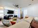 Comfortable living room with fireplace, TV and stylish furnishings at 520 Rob Roy Dr, Clermont, FL 34711
