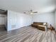 Spacious living room features wood-look floors and plenty of room to relax at 520 Rob Roy Dr, Clermont, FL 34711