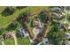 Aerial view of property lines, showcasing a home with a circular driveway, pool, and lush landscaping at 5495 County Road 125, Wildwood, FL 34785