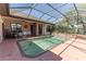 This is a screened in pool on the back of the house at 5495 County Road 125, Wildwood, FL 34785