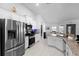 Bright kitchen featuring stainless steel appliances and granite countertops at 5890 Sw 83Rd St, Ocala, FL 34476