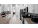 Modern kitchen with stainless steel appliances, granite counters, and backsplash at 5890 Sw 83Rd St, Ocala, FL 34476