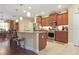 Modern kitchen featuring stainless steel appliances, granite countertops, and ample cabinet space at 6104 Hunters Ridge Ave, Leesburg, FL 34748