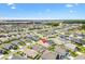 Enjoy this expansive aerial shot of a perfectly situated single-story home in a well-maintained community at 6471 Ecoff Pl, The Villages, FL 34762