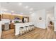 Bright, spacious kitchen featuring a breakfast bar and stainless steel appliances at 6471 Ecoff Pl, The Villages, FL 34762