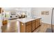 Bright, open concept kitchen featuring modern appliances and seamless flow to the living and dining areas at 6471 Ecoff Pl, The Villages, FL 34762