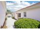 Charming backyard with manicured landscaping and outdoor seating area for relaxing or entertaining at 732 Ramirez Ave, The Villages, FL 32159