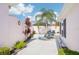 Backyard featuring an entertainment area and lush landscaping at 732 Ramirez Ave, The Villages, FL 32159
