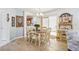 Cozy dining room with stylish furniture and plenty of natural light, perfect for Gathering gatherings at 732 Ramirez Ave, The Villages, FL 32159