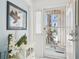 Inviting foyer featuring elegant decor, creating a warm and welcoming atmosphere upon entry at 732 Ramirez Ave, The Villages, FL 32159