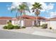 Charming home with mature landscaping and a two-car garage, perfect for comfortable living at 732 Ramirez Ave, The Villages, FL 32159