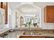 Beautiful granite countertops with stainless steel sink at 732 Ramirez Ave, The Villages, FL 32159