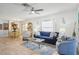 Open-concept living room flowing seamlessly into the dining area, perfect for entertaining and relaxation at 732 Ramirez Ave, The Villages, FL 32159