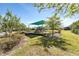 Community playground with swings, slides, and play equipment for recreation at 8272 Procida Isle Ln, Windermere, FL 34786