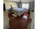 Spacious bedroom featuring hard wood floors and natural light at 879 Little Bend Rd, Altamonte Springs, FL 32714