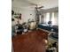 Bedroom with wood floors, ceiling fan, and ample decor at 879 Little Bend Rd, Altamonte Springs, FL 32714