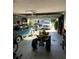 Spacious garage with overhead lighting, and multiple vehicles at 879 Little Bend Rd, Altamonte Springs, FL 32714