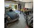 Spacious garage with overhead lighting, bikes, and offroad vehicle at 879 Little Bend Rd, Altamonte Springs, FL 32714