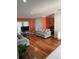 Bright living room featuring hardwood floors, comfortable seating, and modern decor for a welcoming atmosphere at 879 Little Bend Rd, Altamonte Springs, FL 32714