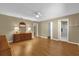 Expansive bedroom with hardwood floors, ceiling fan, dresser, and ample closet space at 8814 Sw 93Rd Ln # B, Ocala, FL 34481